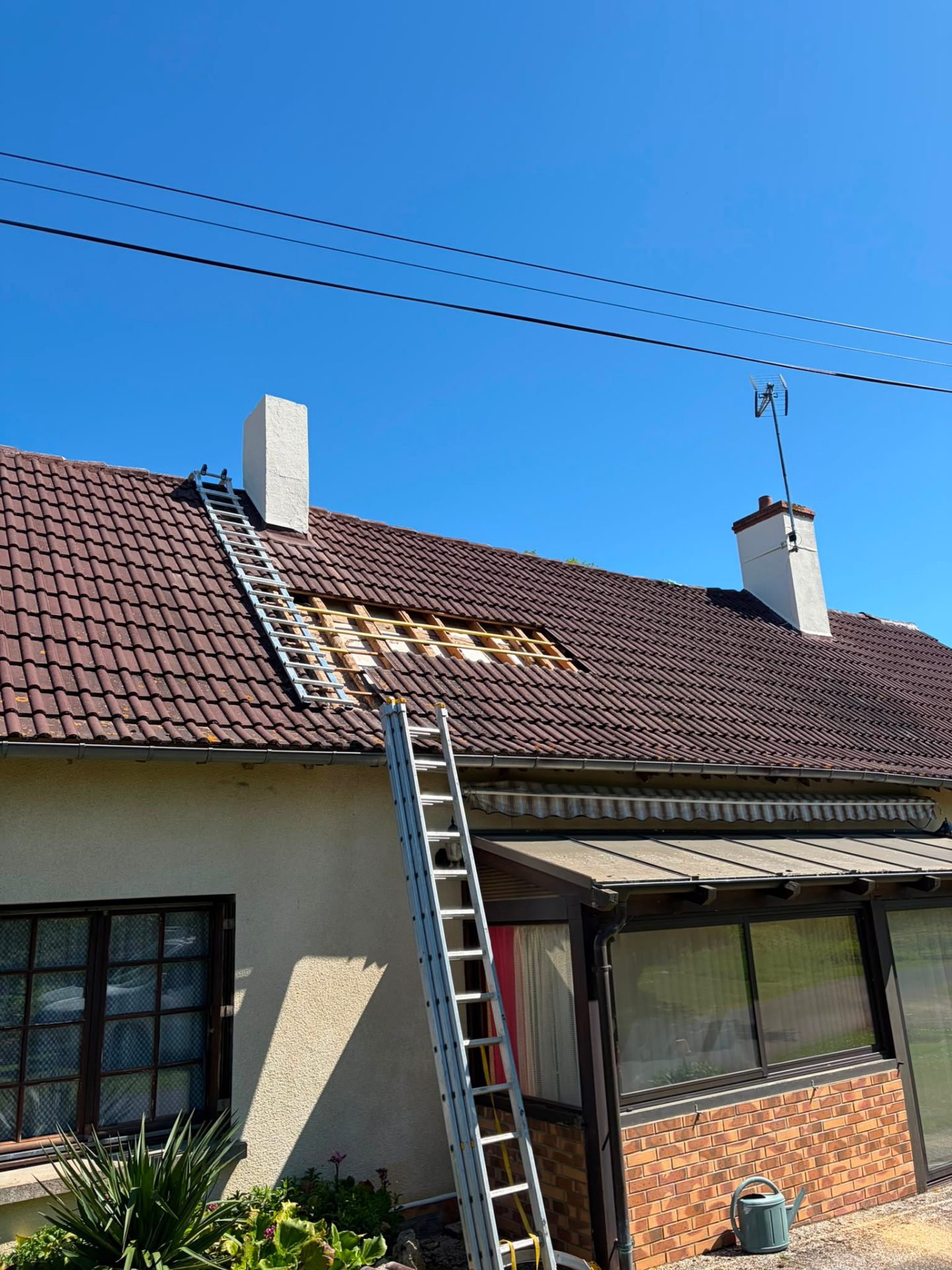 Remplacement de tuiles et réfection de solin de cheminée